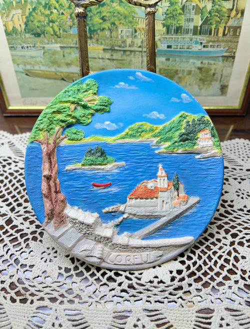 3D hand-painted decorative wall plate depicting a Greek island landscape 8”