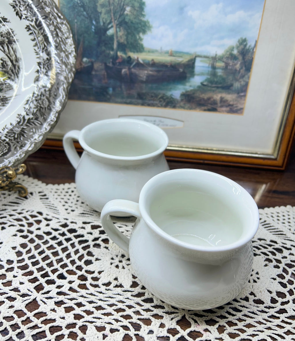 Retro ceramic soup mugs featuring an Oxtail Soup recipe design — pair