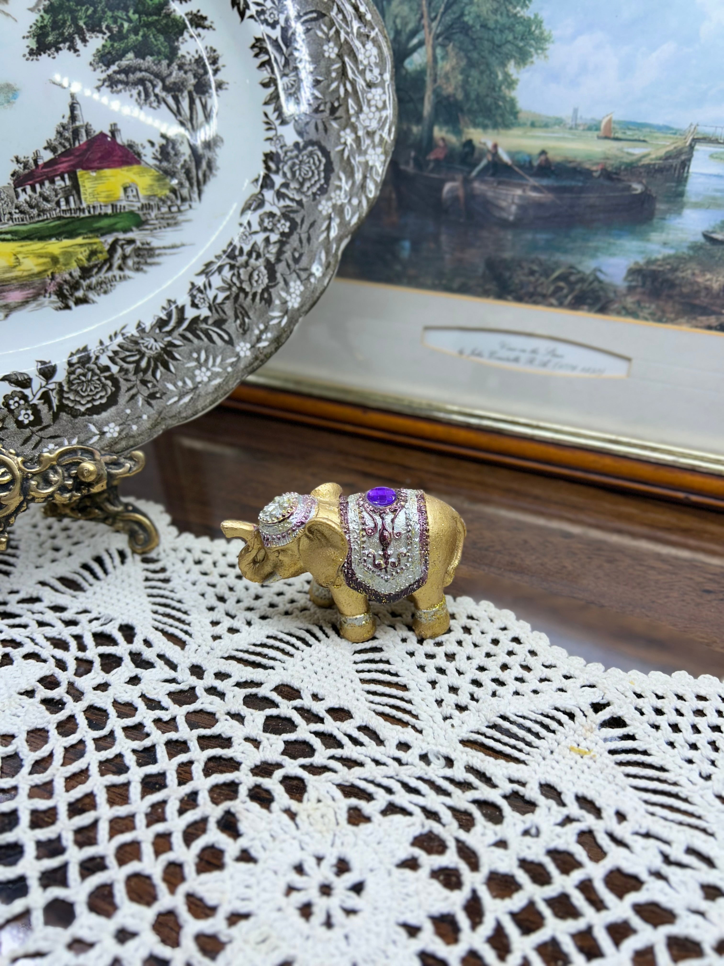 Decorative hand-painted gold elephant figurine