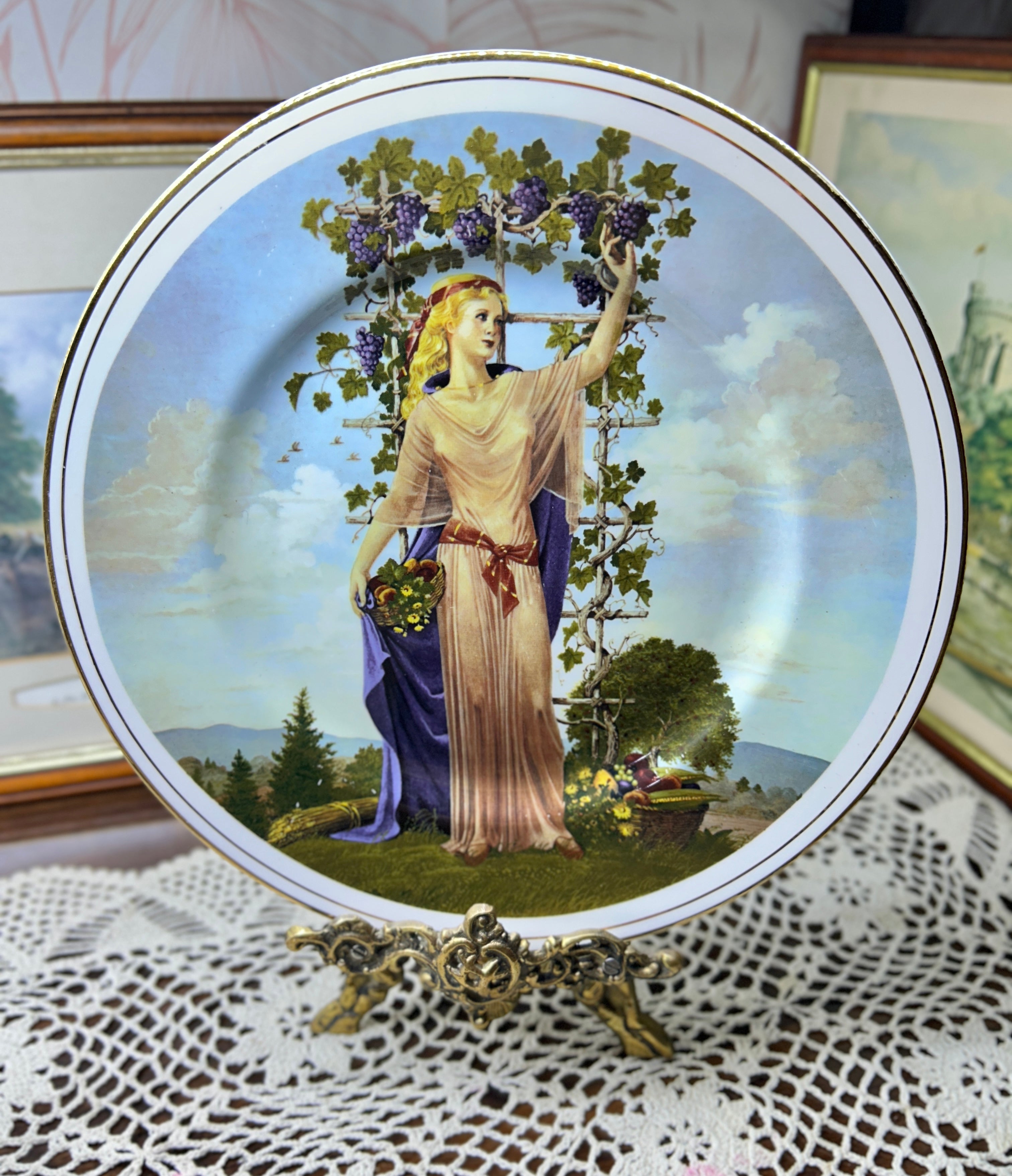 Vintage decorative wall plate "Seasons of the Year" series by artist Charlotte Sternberg 12”