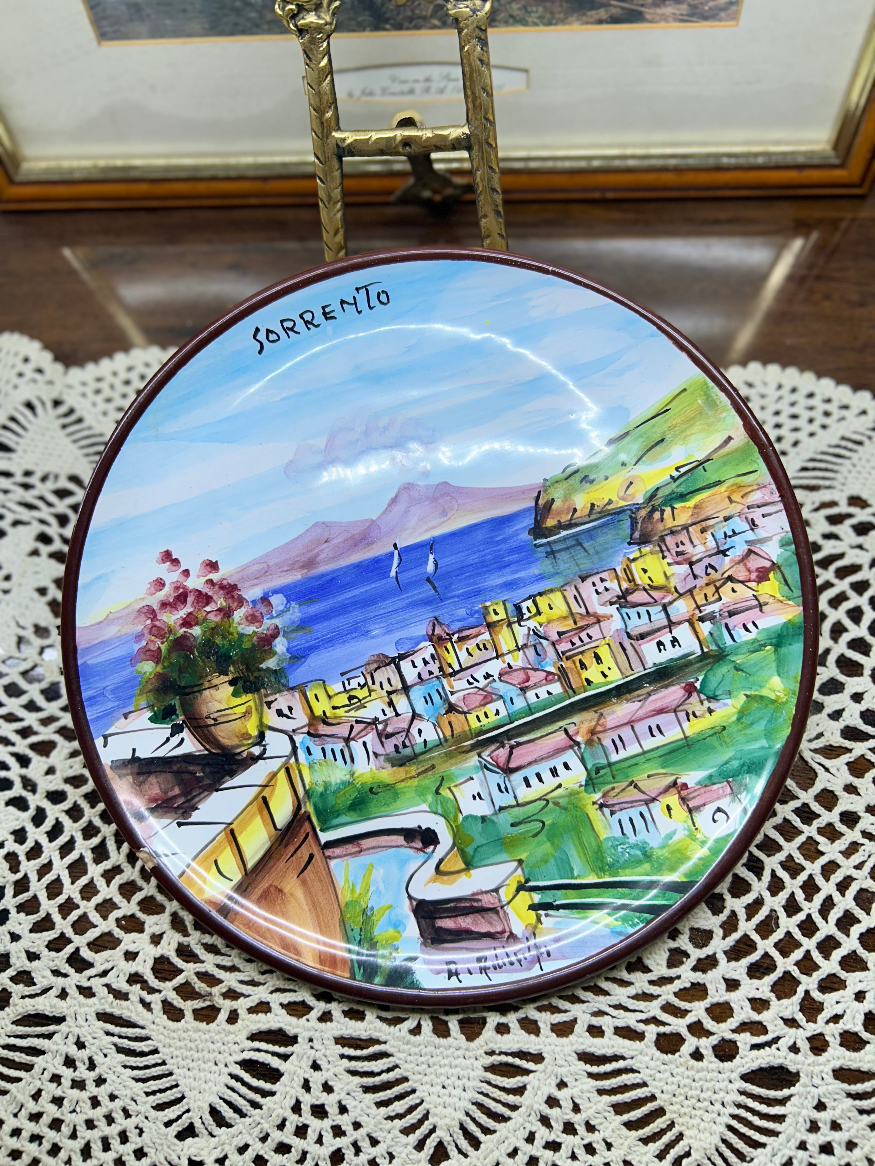 hand-painted ceramic decorative plate featuring a scene from Sorrento, Italy.