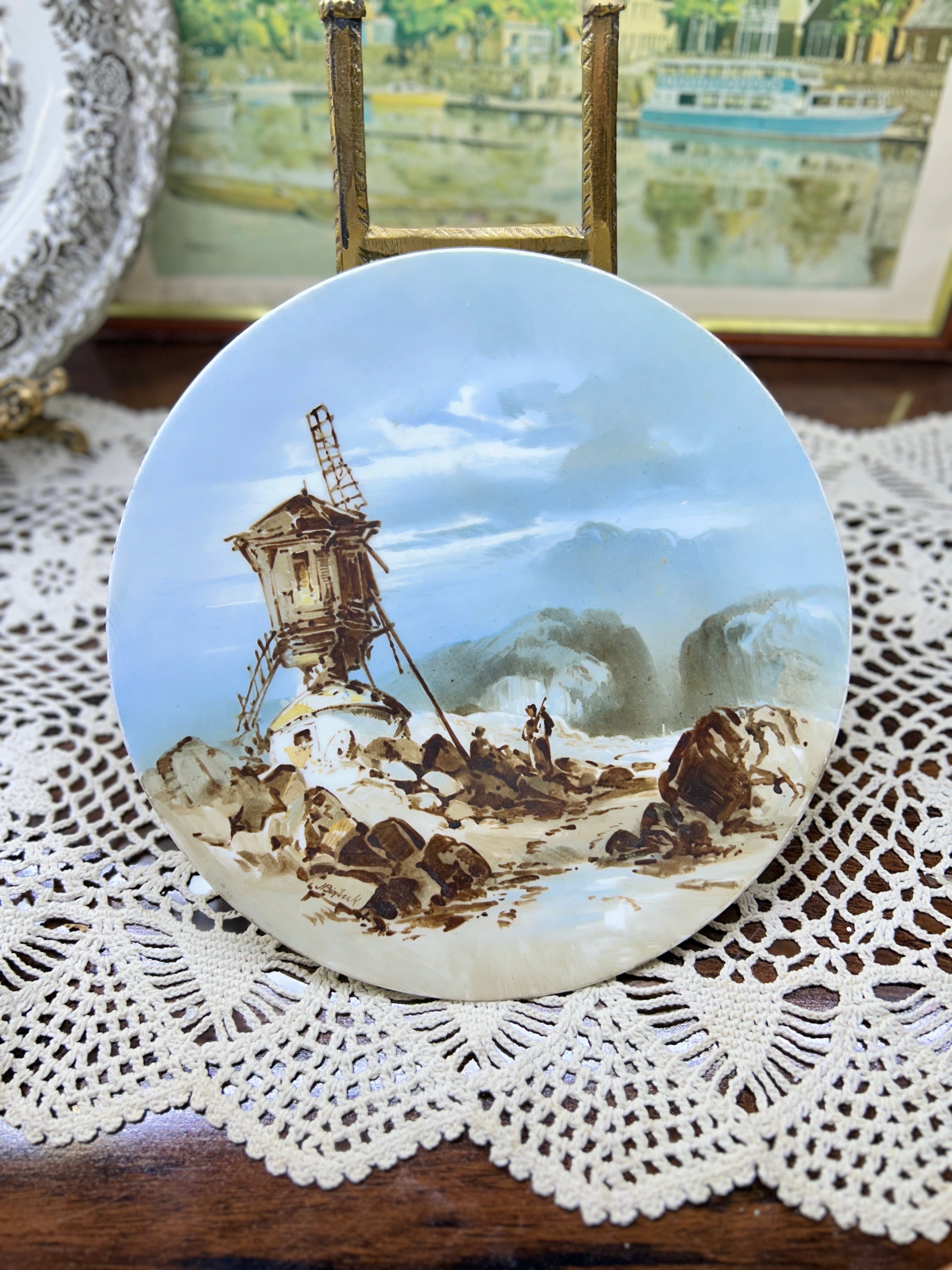 Vintage Dutch scenery hand-painted wall plate with a scene of a rustic windmill landscape 8”
