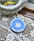 Vintage Wedgwood blue Jasperware ashtray — featuring white relief designs.
