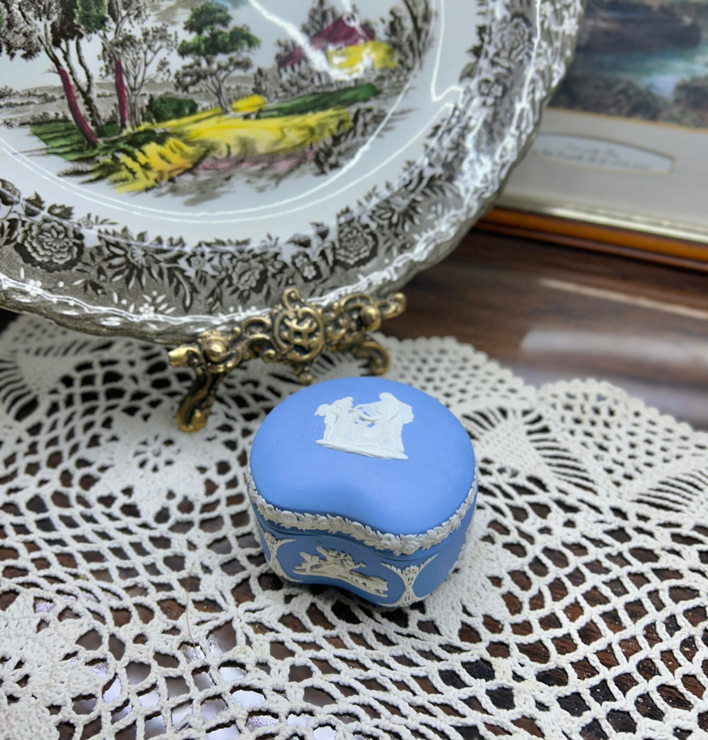 Wedgwood blue Jasperware kidney-shaped trinket box — featuring applied white neoclassical relief decorations