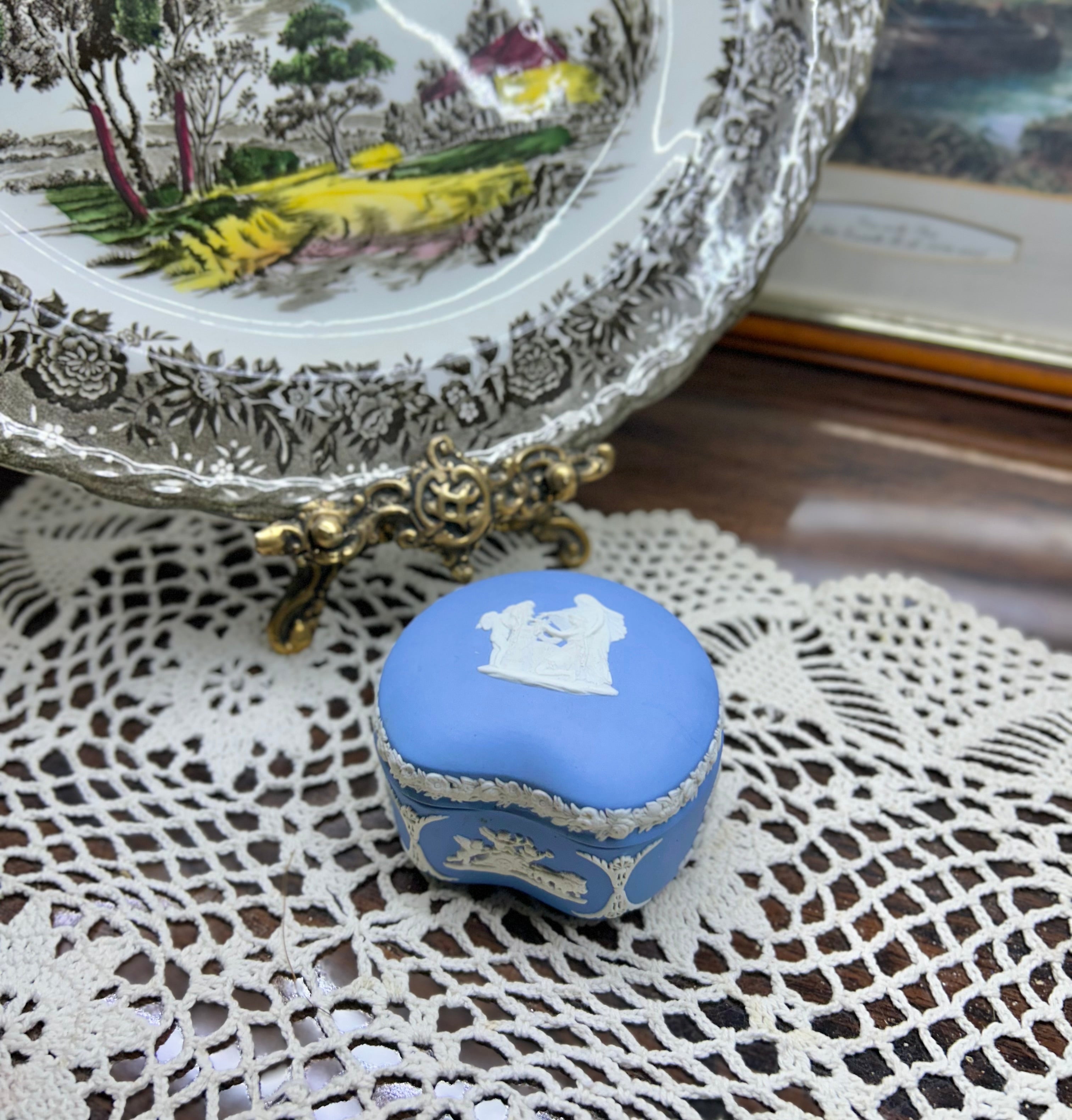 Wedgwood blue Jasperware kidney-shaped trinket box — featuring applied white neoclassical relief decorations