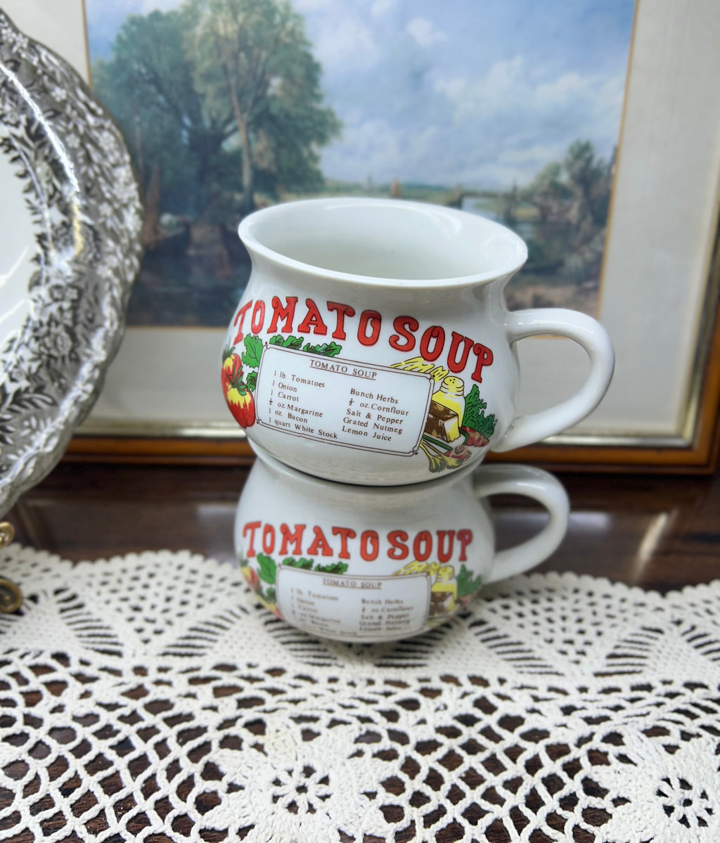 Retro ceramic soup mugs featuring tomato Soup recipe design.