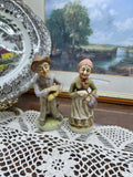 Vintage ARDCO ceramic figurines depict an elderly couple