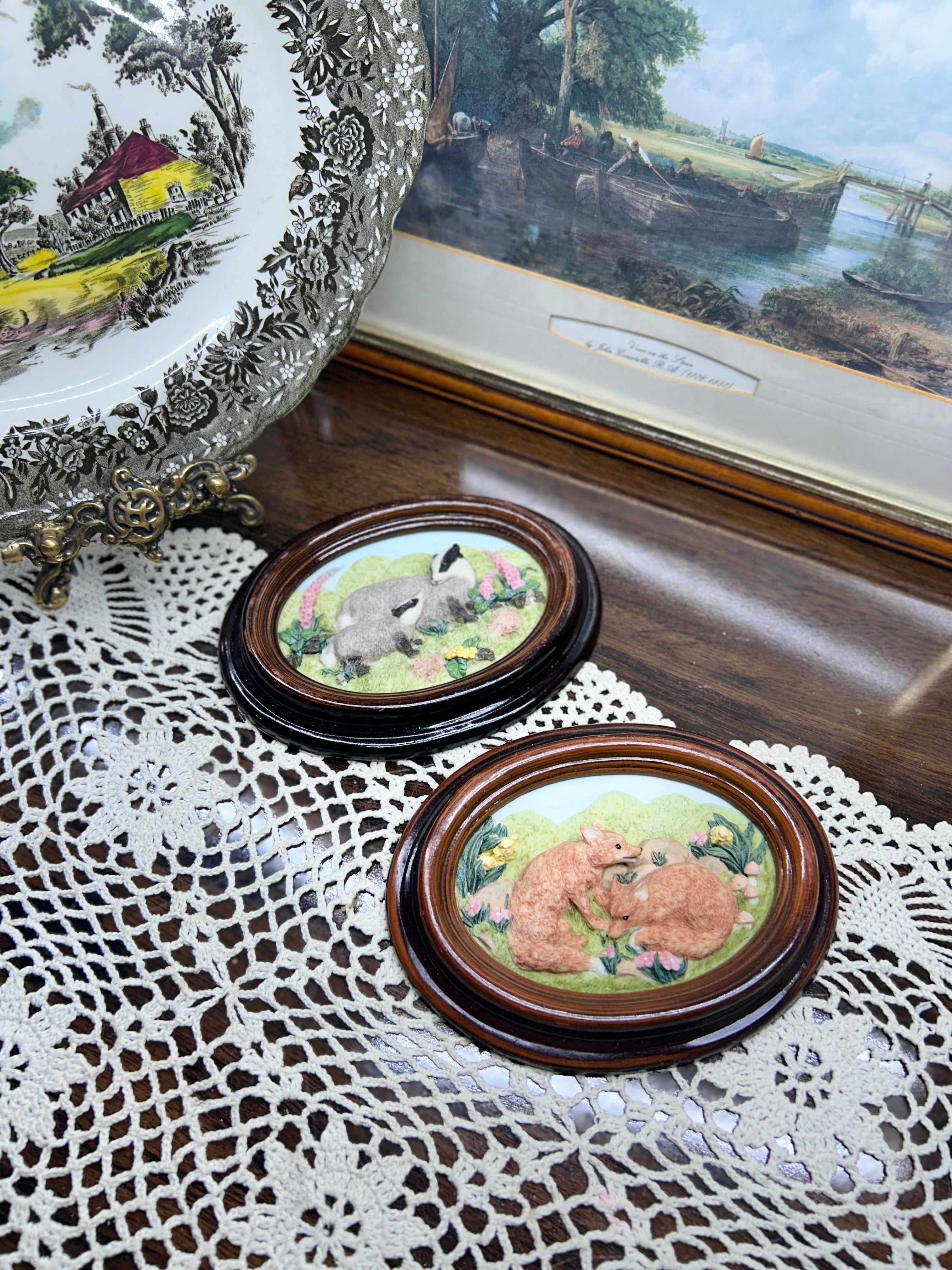 vintage PAIR OF collectible wall plaques ceramic, featuring felted or sculpted designs of British wildlife