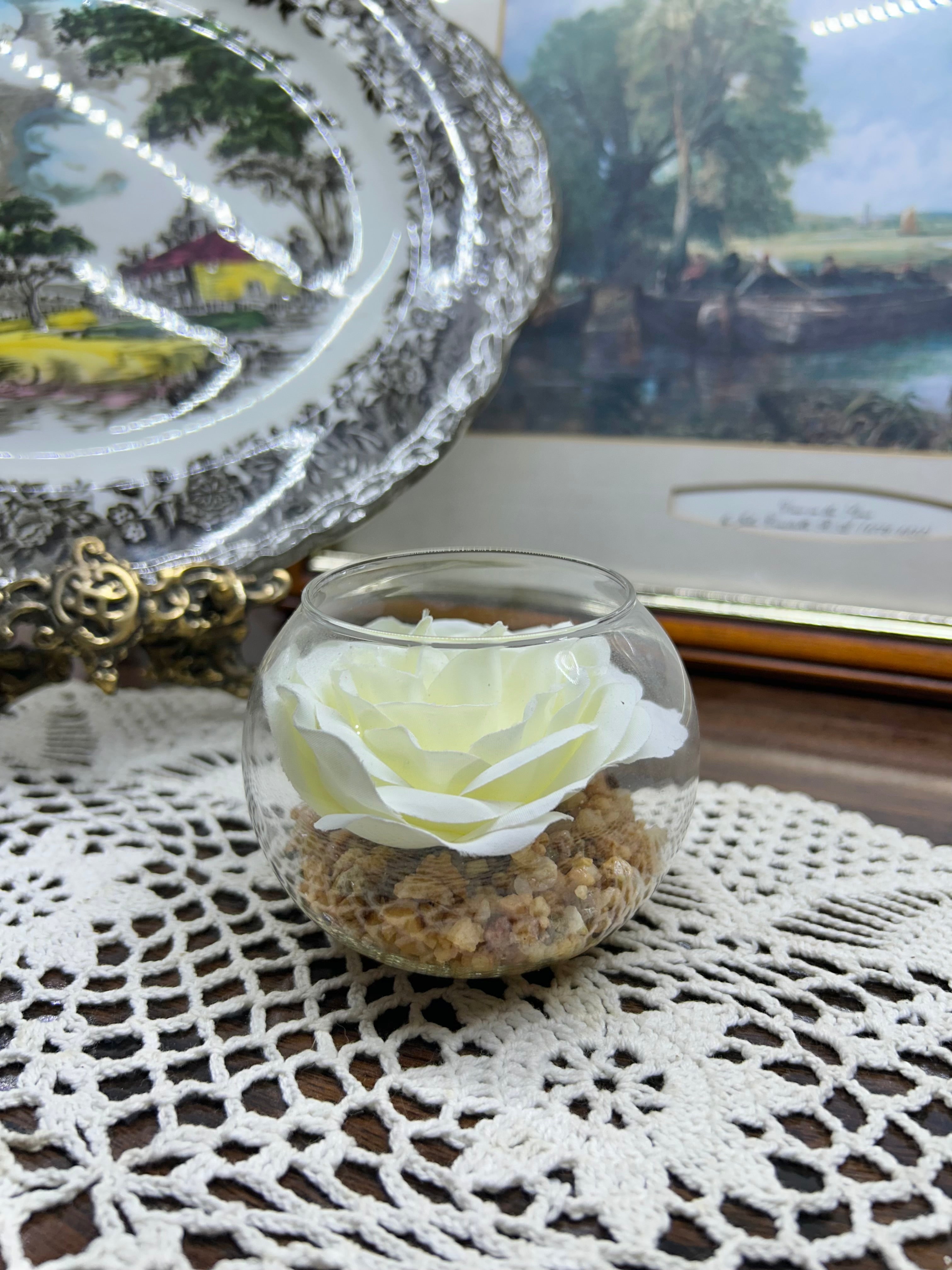 Decorative white rose in a glass bowl — England