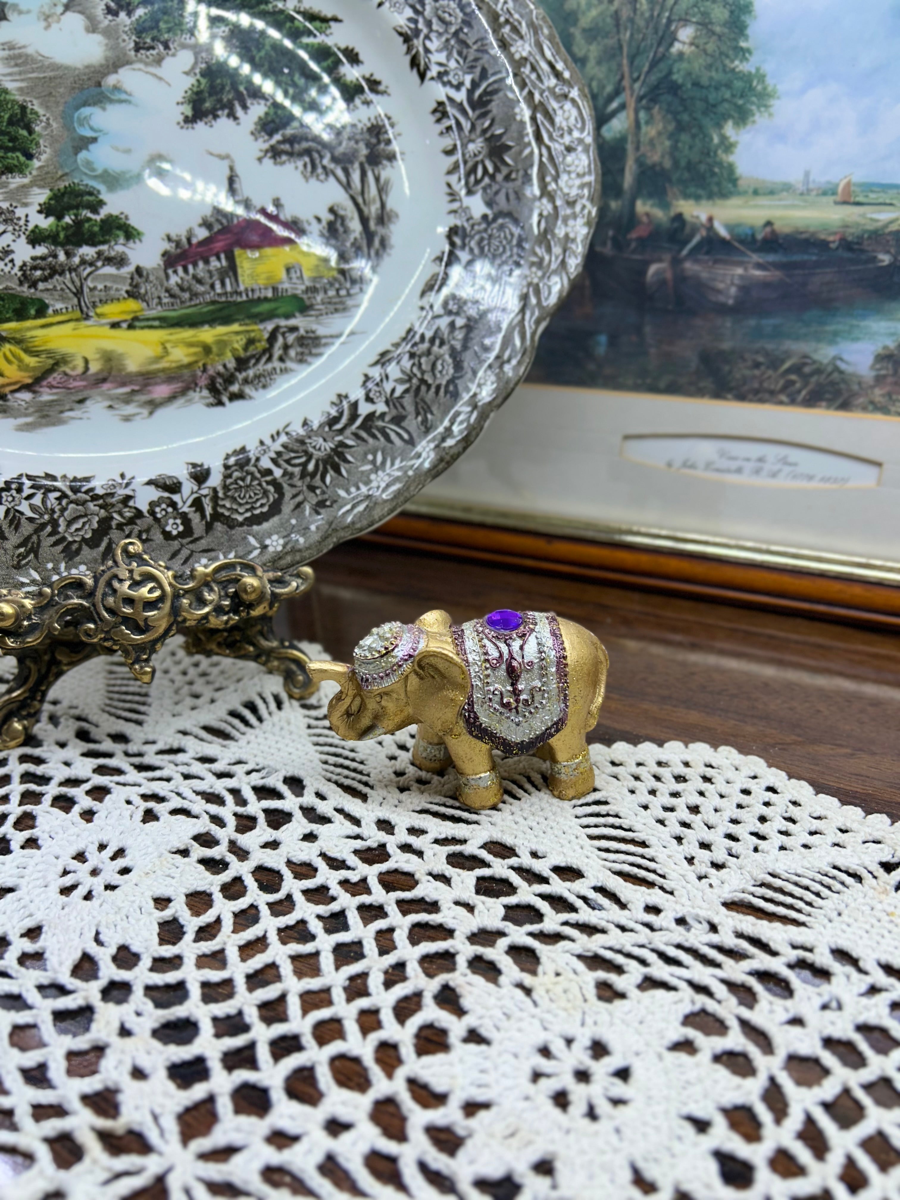 Decorative hand-painted gold elephant figurine
