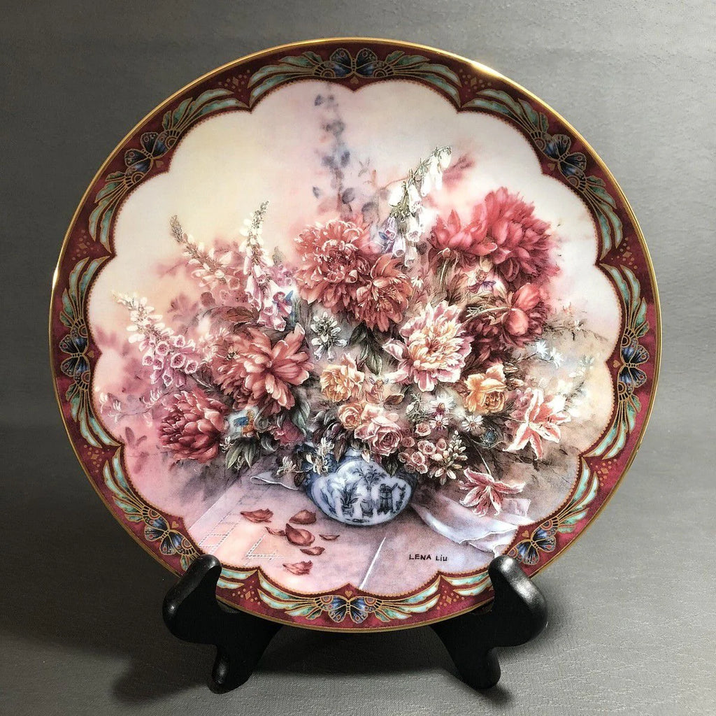 Rare pair of 1992 limited edition “Floral Playmates” collector’s plates by Lena Liu — with 22 karat gold