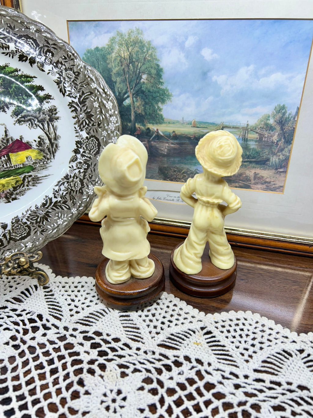 Vintage pair of Italian-made sculptures with wooden bases