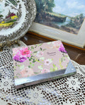 Paragon "Passion" writing set featuring a floral design on a pink background — boxed