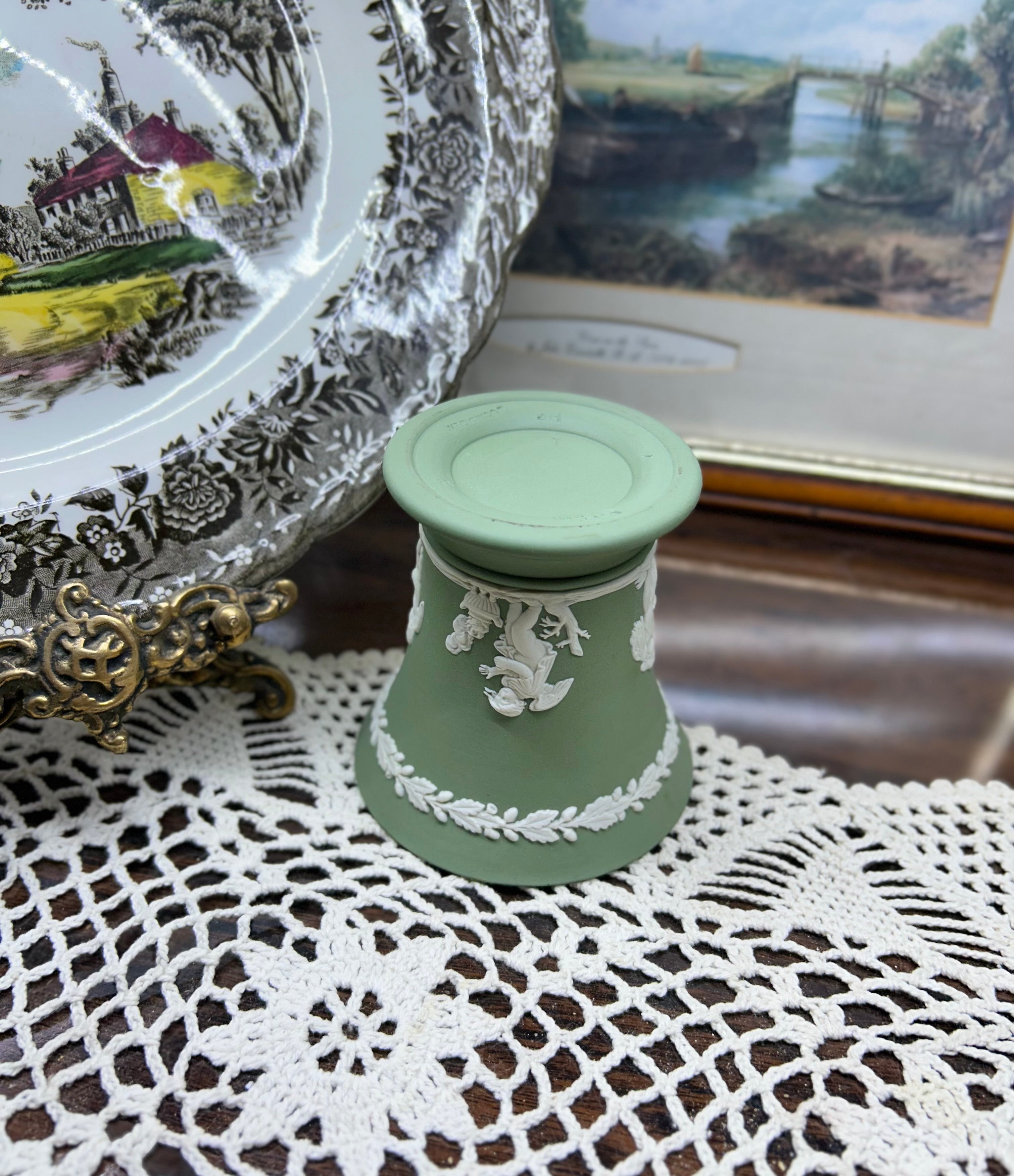 Vintage Wedgwood sage green Jasperware flared trumpet vase — featuring neoclassical putti bas-relief figures.