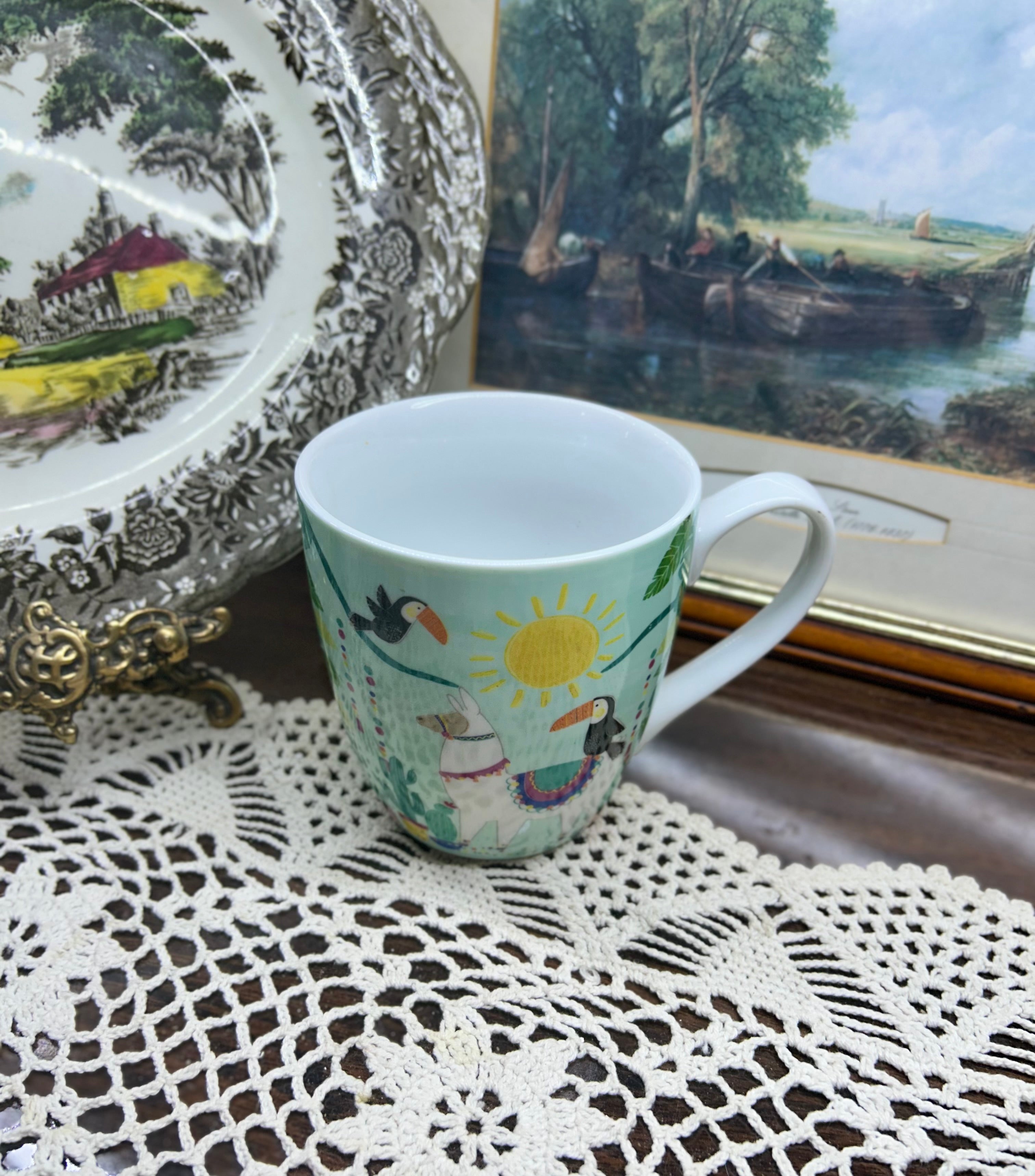 TESCO llama and toucan  design mug — ceramic