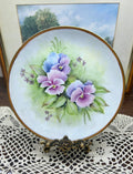 Vintage hand-painted purple pansies wall plate, signed by artist S. Roberts 1993