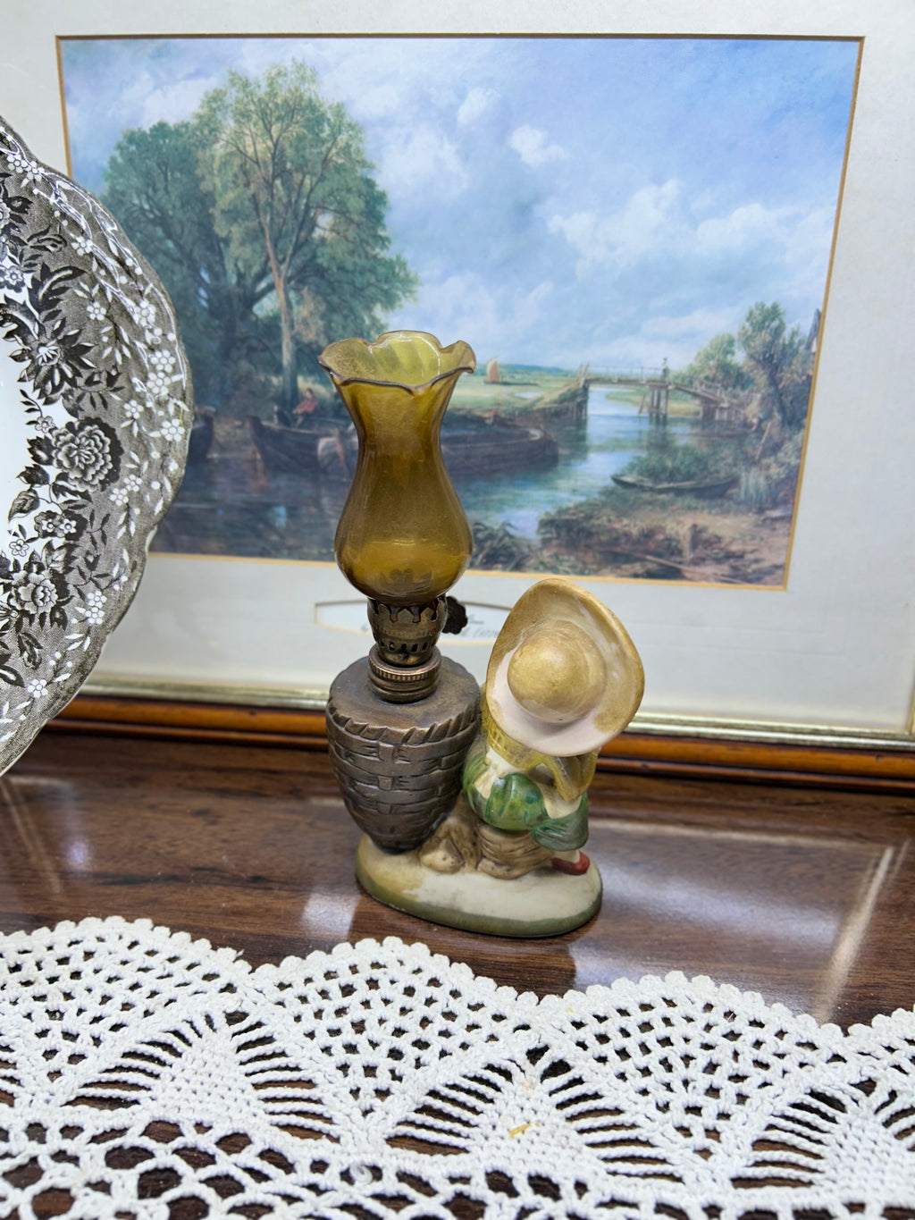 Vintage kerosene oil lamp with little girl with book in ceramic 
Height
