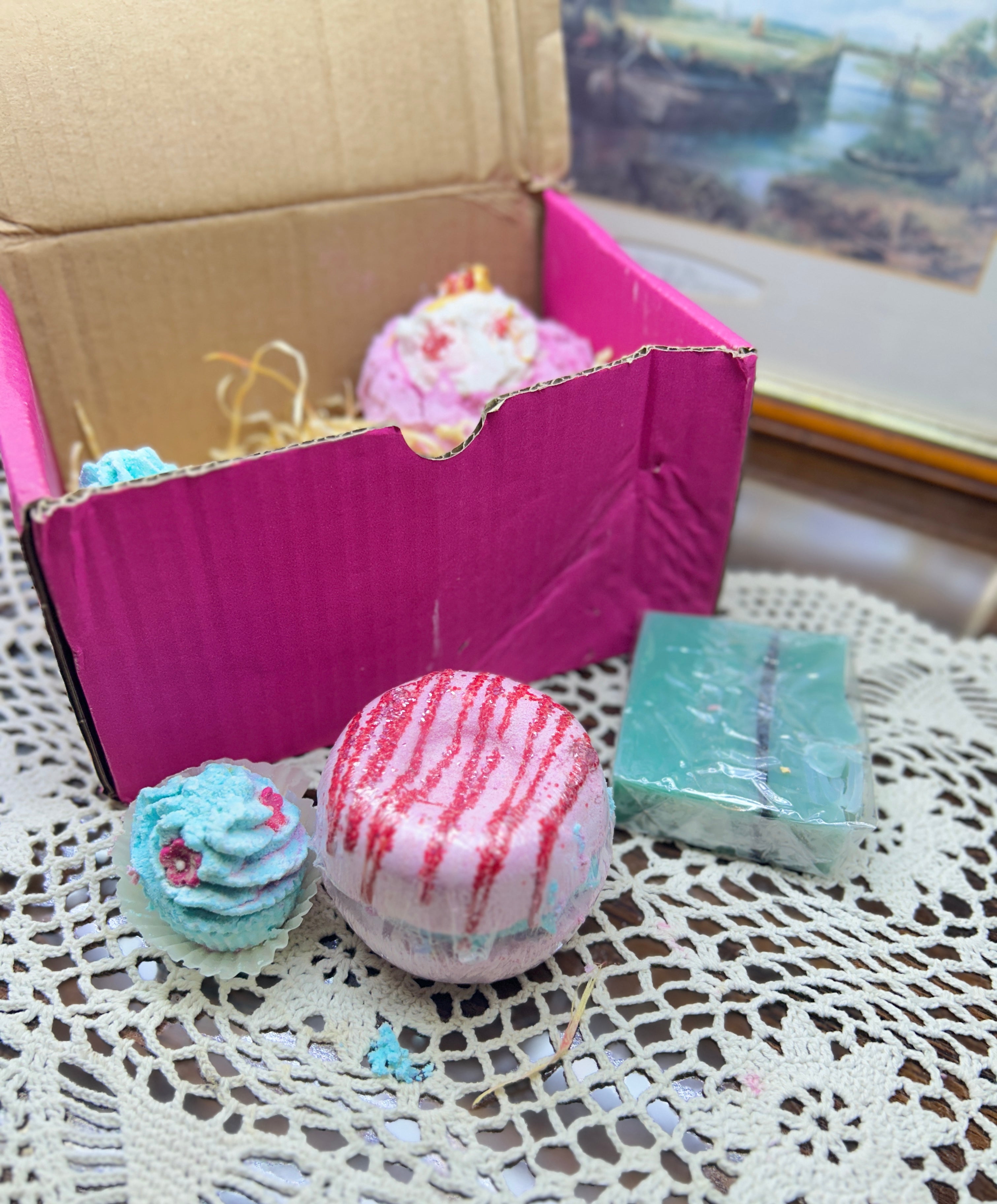 Bomb Cosmetics gift set featuring dessert-themed bath bombs and handmade soap — boxed