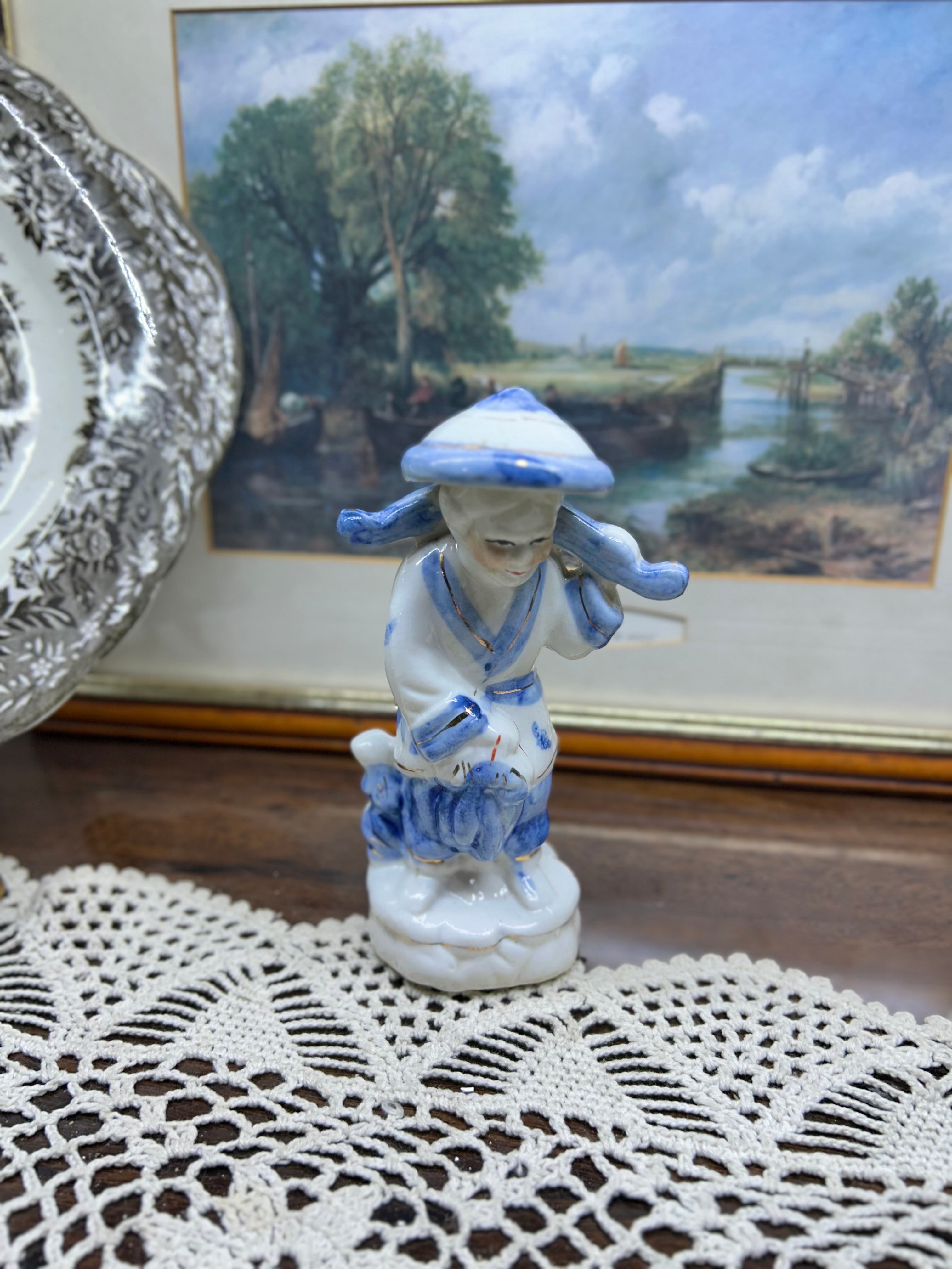 Vintage Blue and White Porcelain Chinese Fisherman figurine