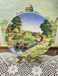Royal Worcester titled "Jane and Lilly" wall plate from the Romance of the Waterways series 7”