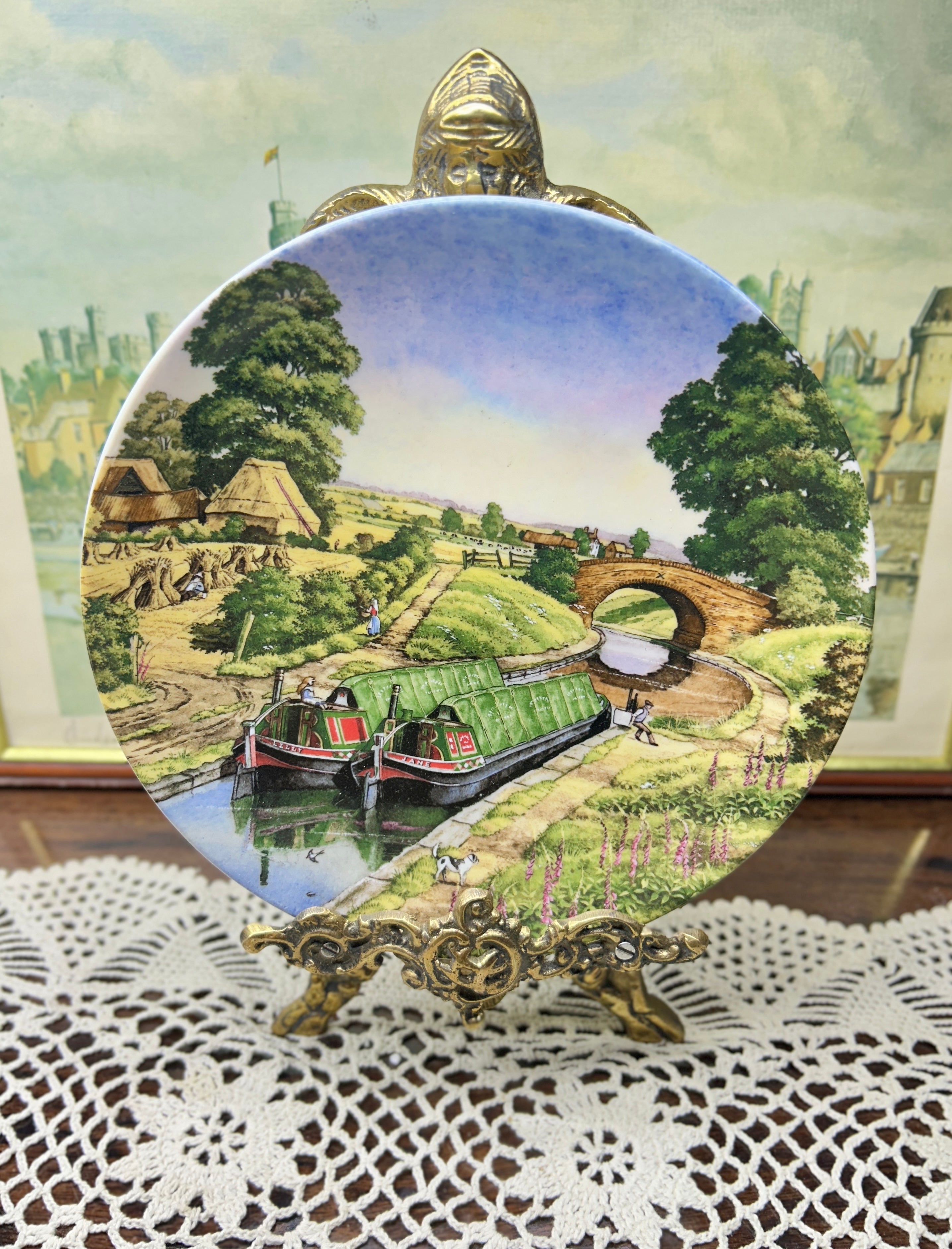 Royal Worcester titled "Jane and Lilly" wall plate from the Romance of the Waterways series 7”