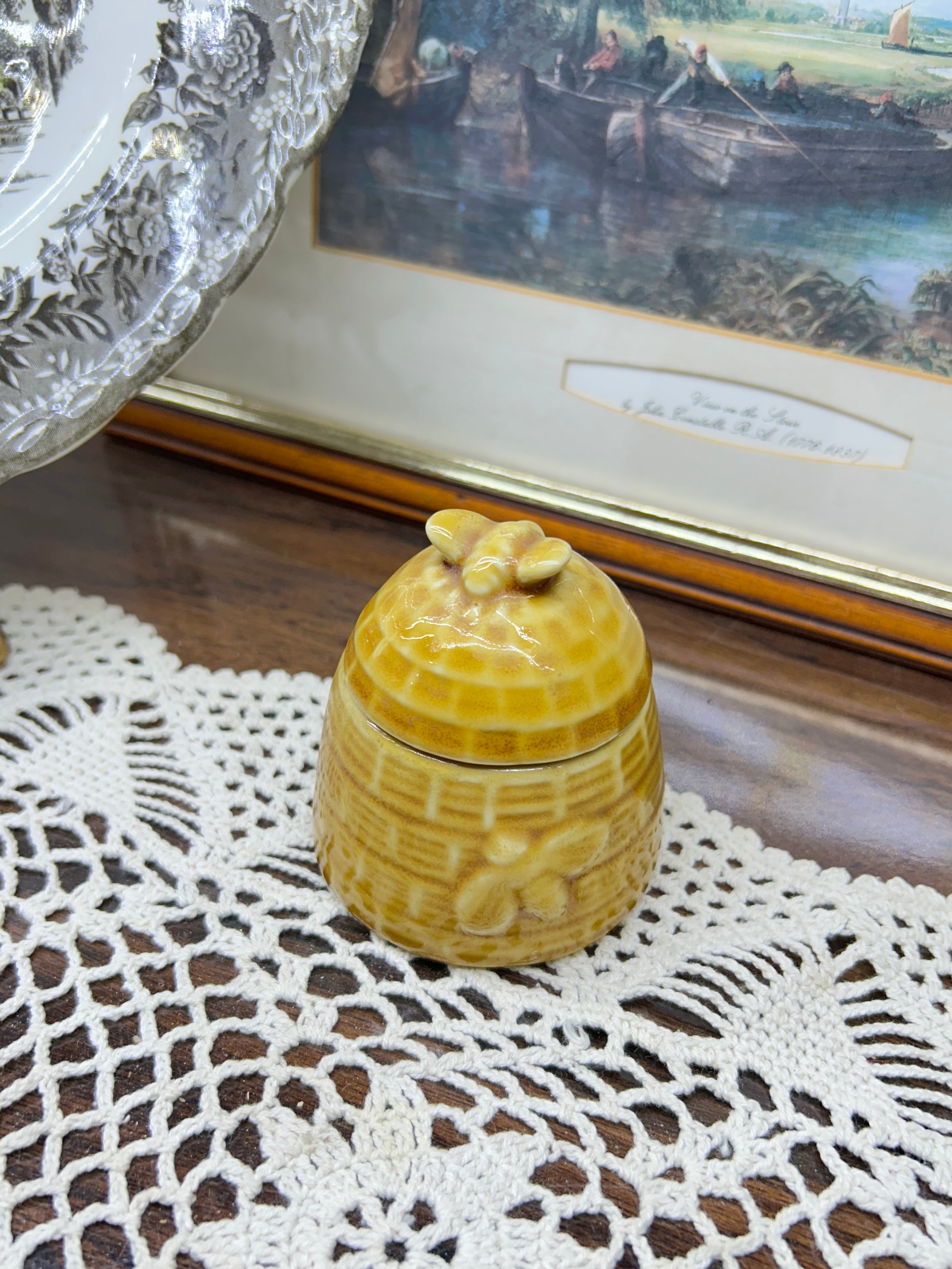 Vintage yellow mini ceramic honey pot crafted to resemble a beehive