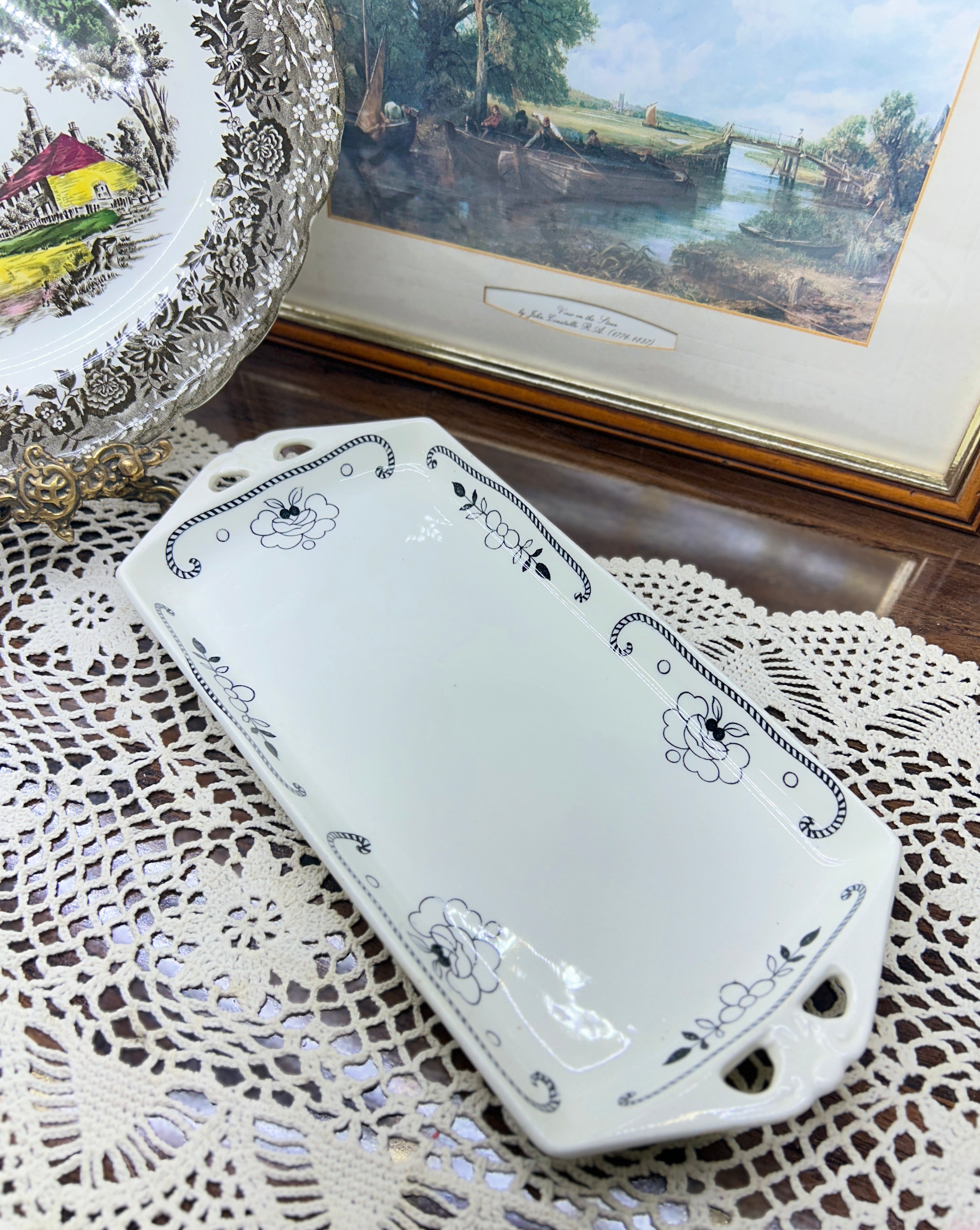 WOOD & SONS’s rectangular dish featuring a rope pattern with ornate handles 14”