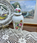 Vintage crown Staffordshire ginger jar — features a a vibrant floral pattern topped with a gold-accented lid 11”