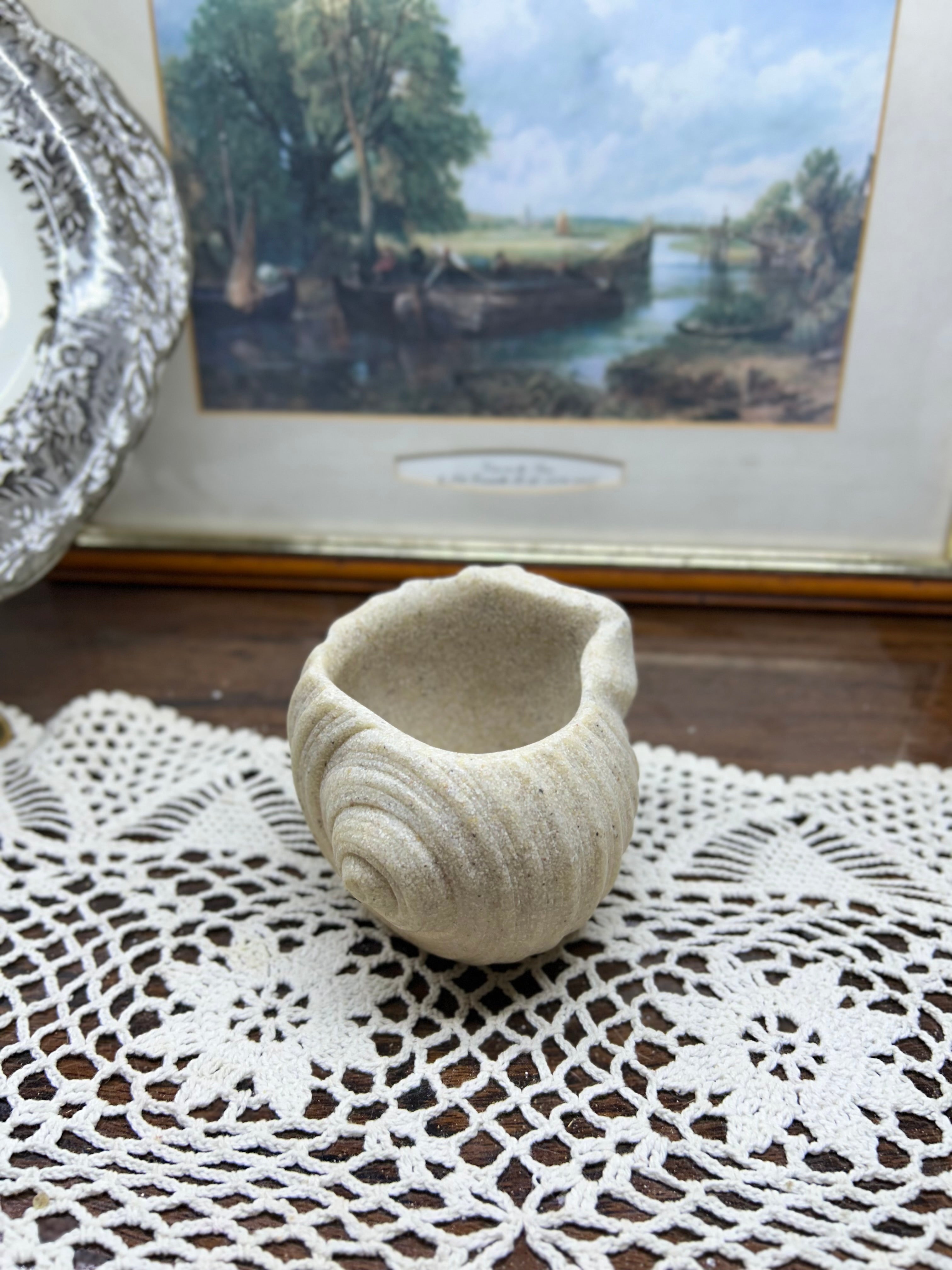 Hand-crafted seashell snail shaped planter