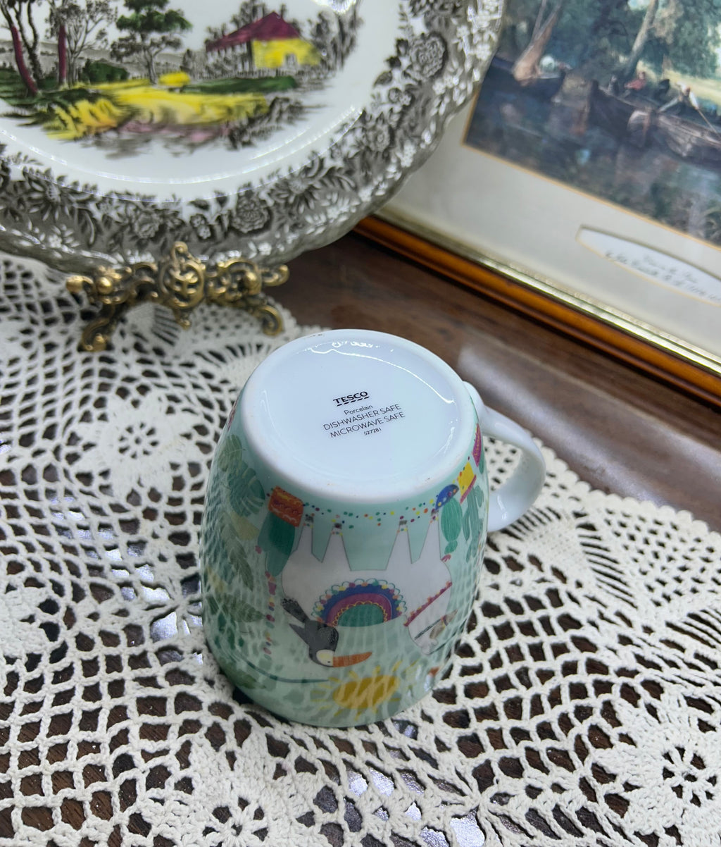 TESCO llama and toucan  design mug — ceramic
