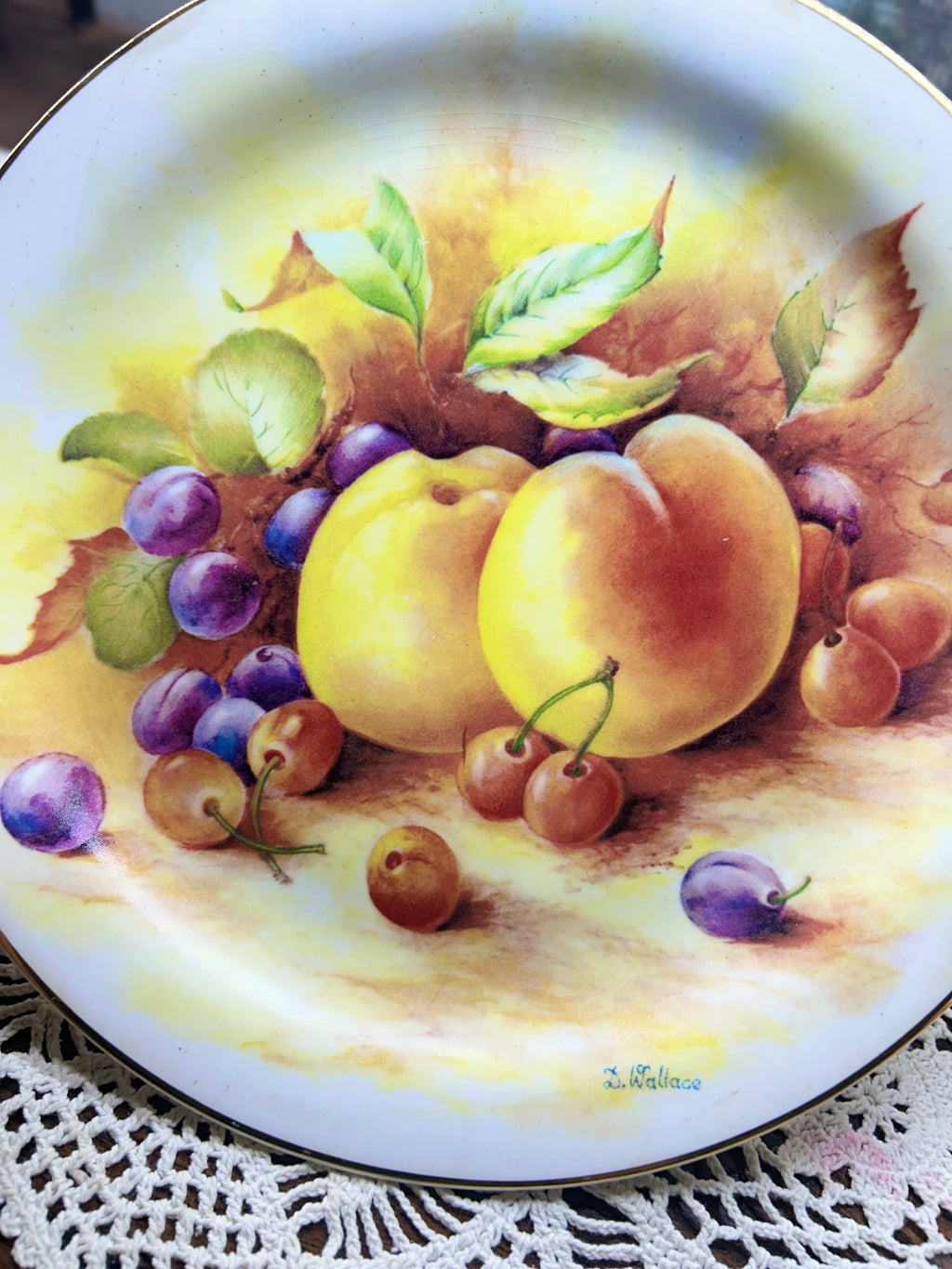 Vintage wall decorative plate featuring fruit motifs painted by D. Wallace
