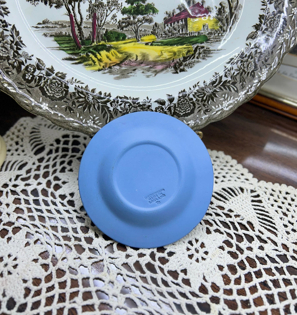 Vintage Wedgwood blue Jasperware ashtray — featuring white relief designs.