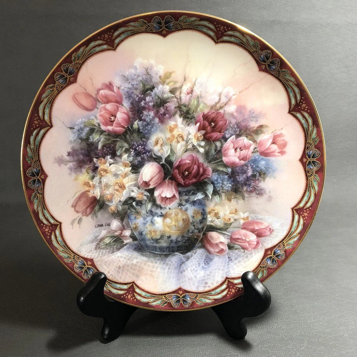 Rare pair of 1992 limited edition “Floral Playmates” collector’s plates by Lena Liu — with 22 karat gold