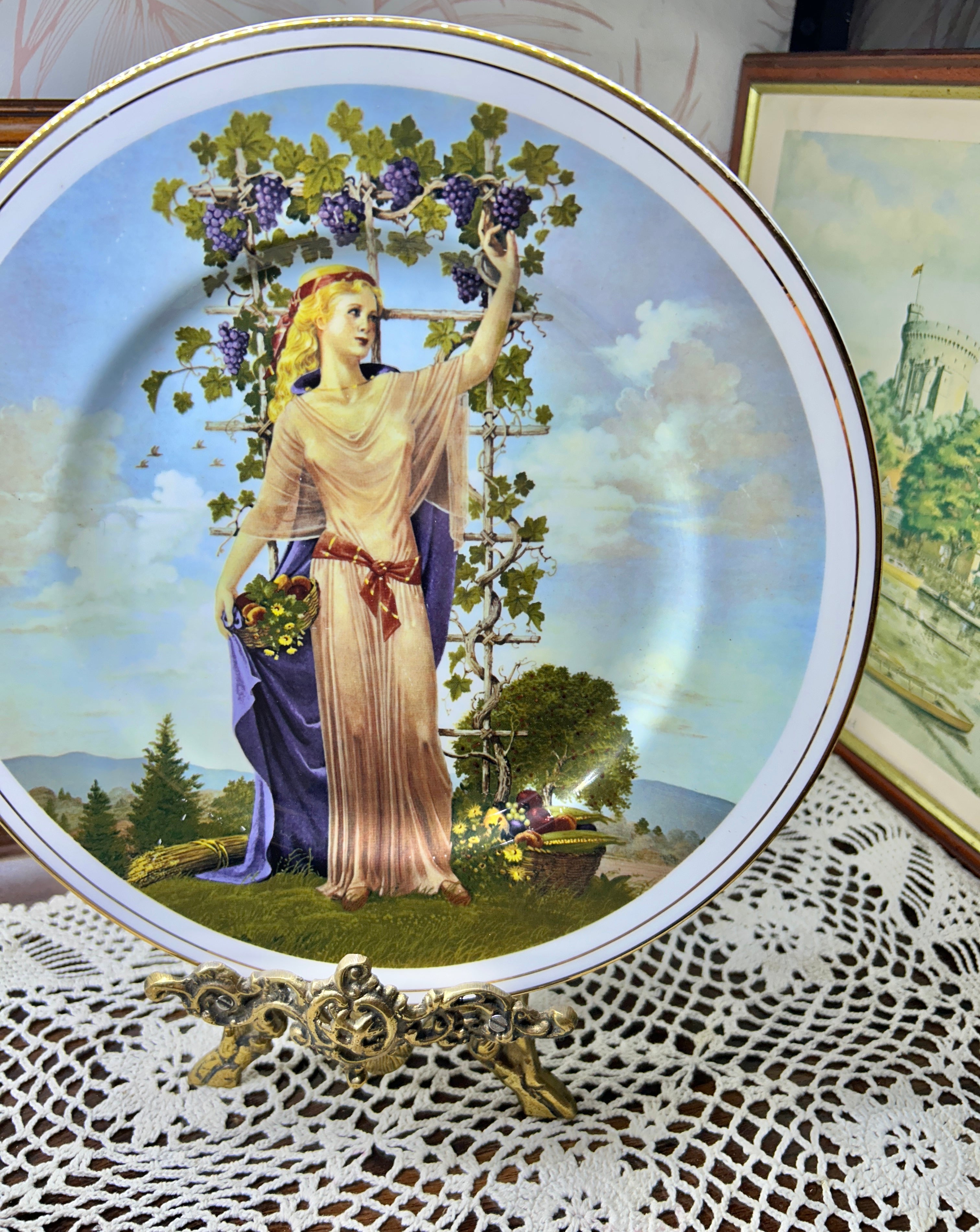 Vintage decorative wall plate "Seasons of the Year" series by artist Charlotte Sternberg 12”