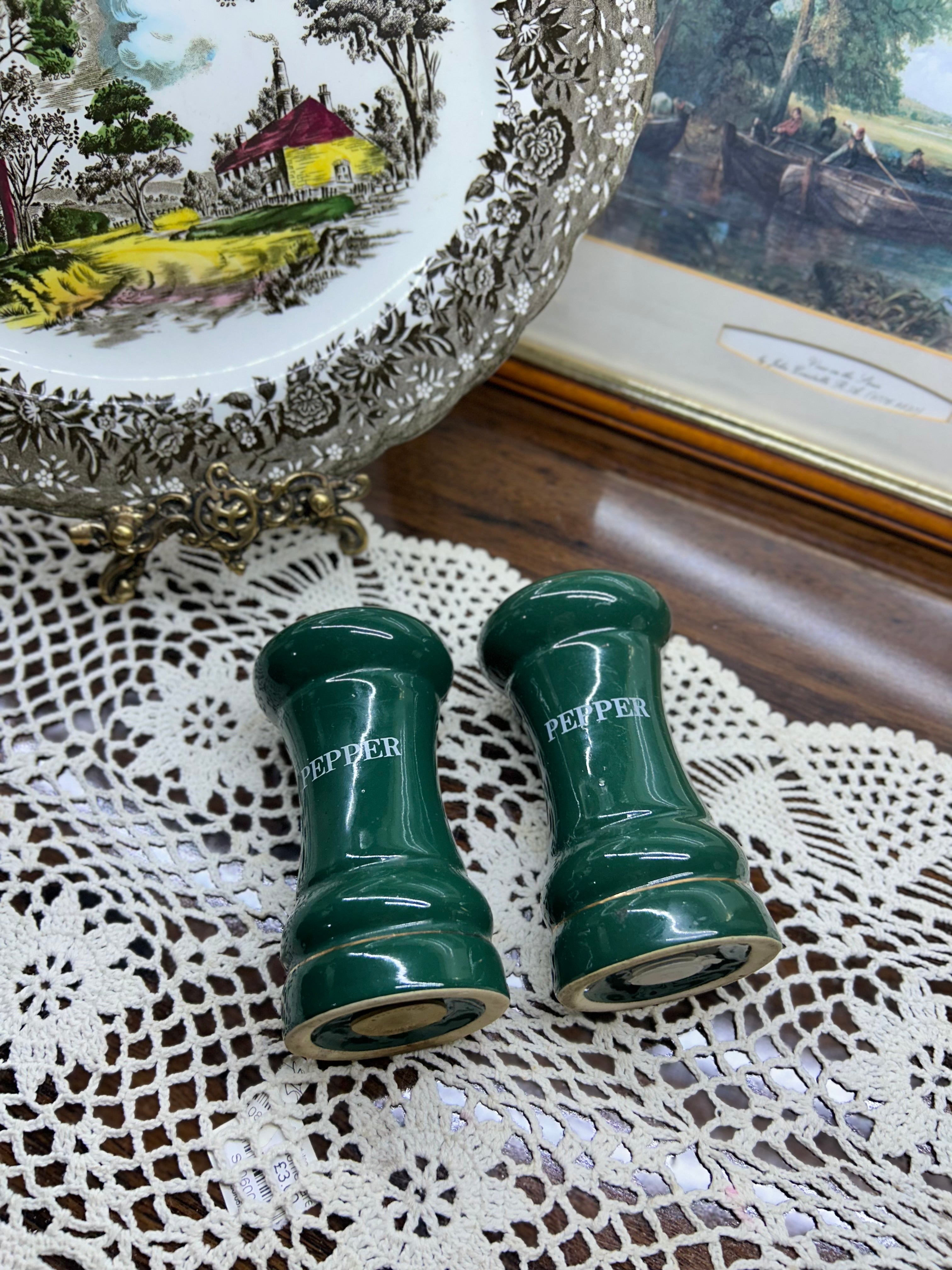 vintage green porcelain salt and pepper shakers feature gold trim and are labeled "PEPPER"