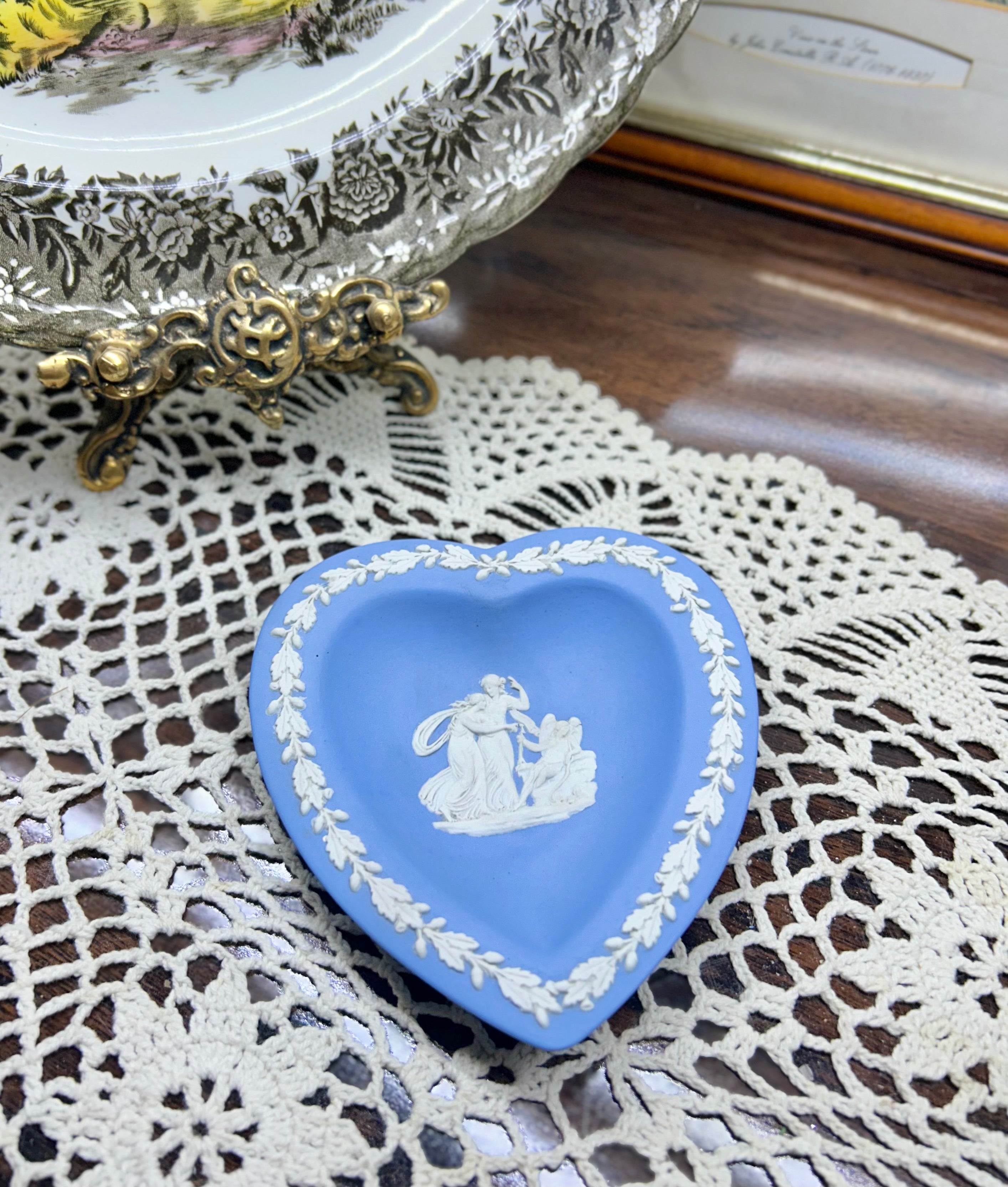 Vintage Wedgwood Jasperware heart-shaped trinket dish — in pale blue with white classical motifs.