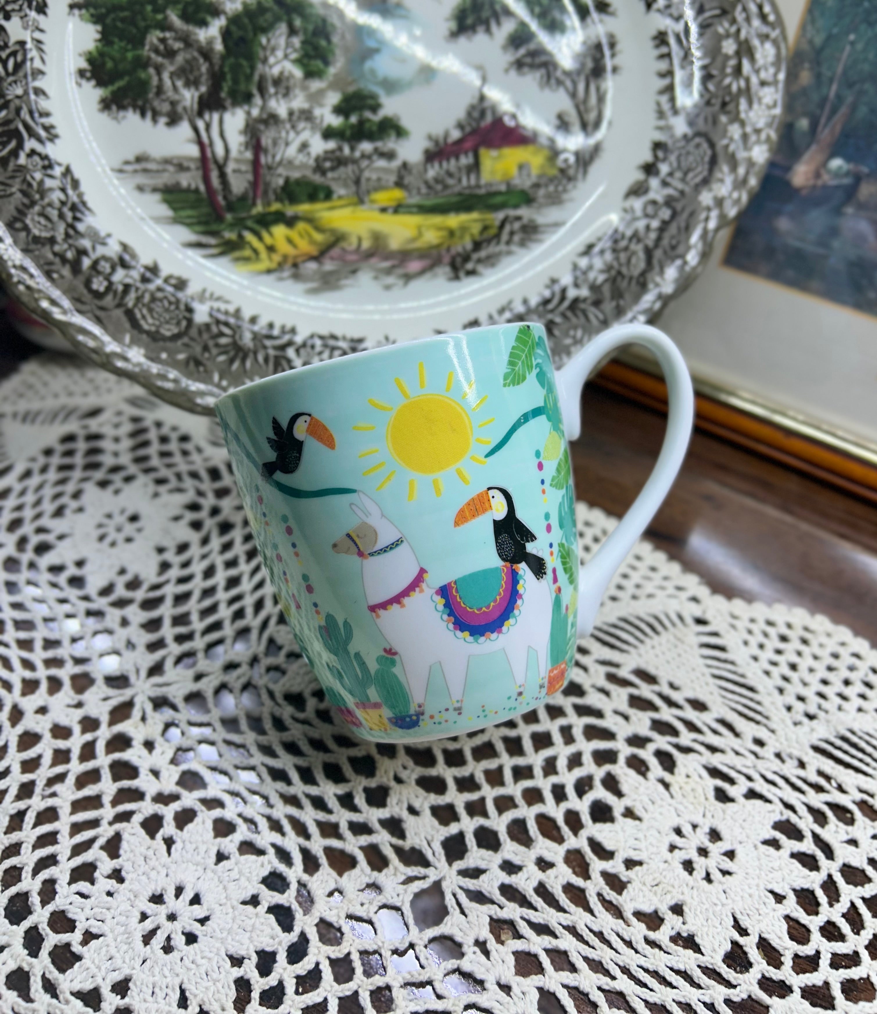 TESCO llama and toucan  design mug — ceramic