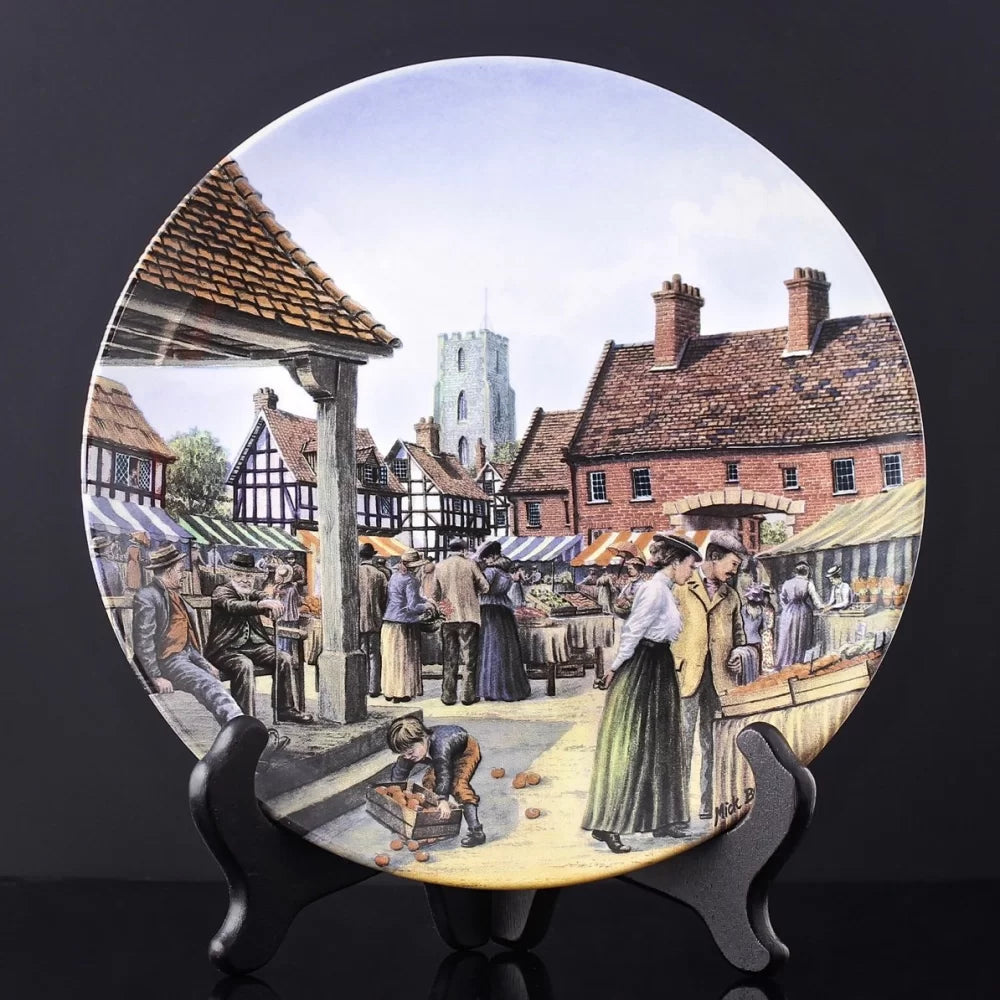 Royal Doulton "The Market Square" collector plate 8”, part of the "Journey Through the Village" series.