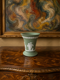 Vintage Wedgwood sage green Jasperware flared trumpet vase — featuring neoclassical putti bas-relief figures.